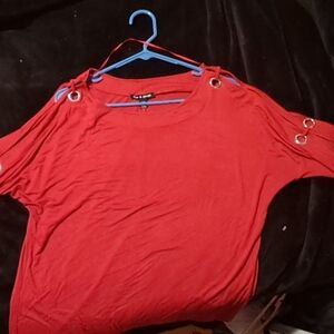 Red Blouse with Ring Accents